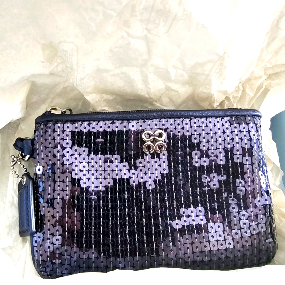 Retired Special Edition COACH wristlet, navy blue.